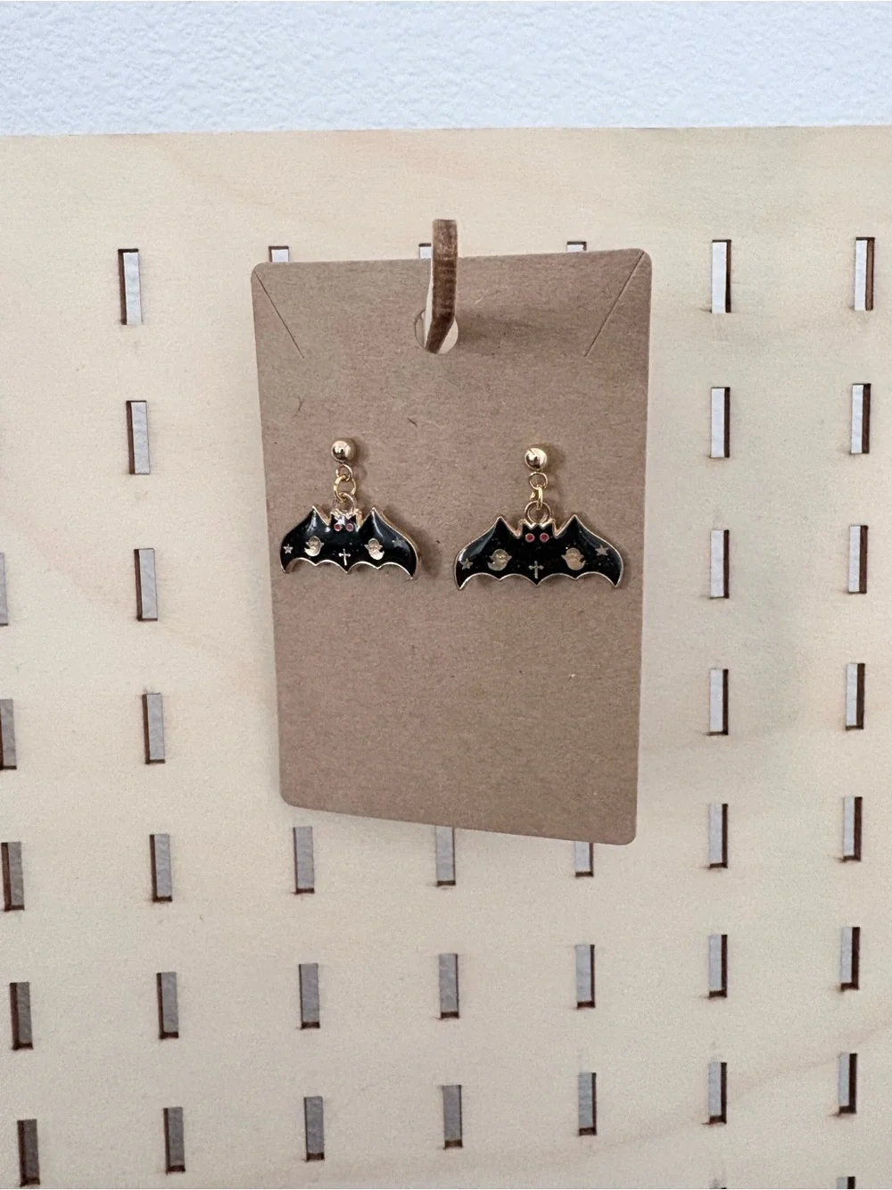 Handcrafted vampire bat charms dangle earrings